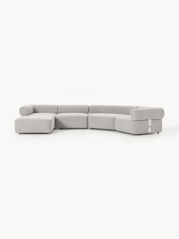 Sofá modular grande en tejido bouclé con reposapiés Anton (izquierda/derecha) - Westwing Collection