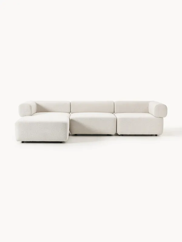 Sofá modular en tejido bouclé Anton (4 plazas), con reposapiés (izquierda/derecha) - Westwing Collection